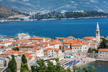 Panoramic cityscape of The Old Town of Budva, Montenegro, beautiful top view of Adriatic Sea and the Balkan Mountainsの写真素材