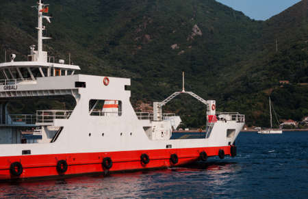Bay of Kotor, Herceg Novi, Montenegro - August 13 2021: barge ship transports tourists and cars across the bayのeditorial素材