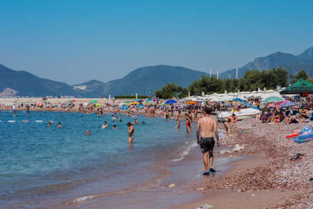 Budva, Montenegro - August 12 2021: public beach near Saint Stephen's island (Sveti-Stefan)のeditorial素材