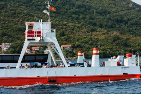 Bay of Kotor, Herceg Novi, Montenegro - August 13 2021: barge ship transports tourists and cars across the bayのeditorial素材