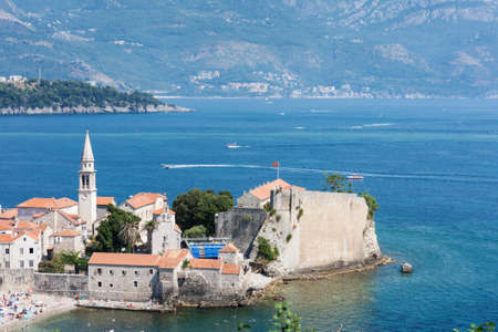 Panoramic cityscape of The Old Town of Budva, Montenegro, beautiful top view of Adriatic Sea and the Balkan Mountainsの写真素材