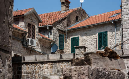 Ancient street, historical building in the old town of Kotor, Montenegro, Europe, Adriatic sea and mountainsの写真素材