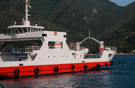 Bay of Kotor, Herceg Novi, Montenegro - August 13 2021: barge ship transports tourists and cars across the bayのeditorial素材