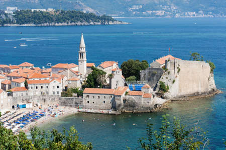 Panoramic cityscape of The Old Town of Budva, Montenegro, beautiful top view of Adriatic Sea and the Balkan Mountainsの写真素材