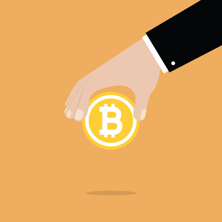 Businessman Hand Holding Bitcoin.のイラスト素材