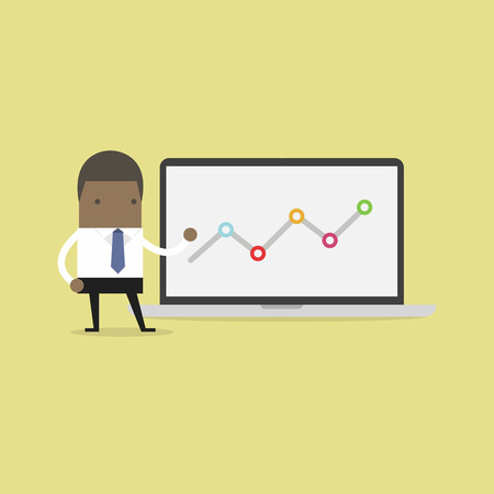 African businessman pointing at graph in laptop.のイラスト素材