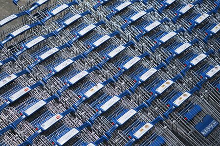 Nonthaburi, Thailand - September 11, 2018 : IKEA shopping carts lined up in rows in trolleys area of IKEA Store in Nonthaburi, Thailand. IKEA is the world's largest furniture retailer.のeditorial素材