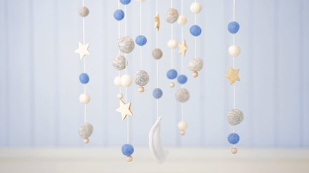 Baby crib mobile. Toys above the baby crib. Hanging soft balls for the child.