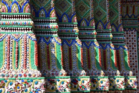 ceramic artificial on base of pagoda in royal temple, grand temple in Bangkok, Thailand.