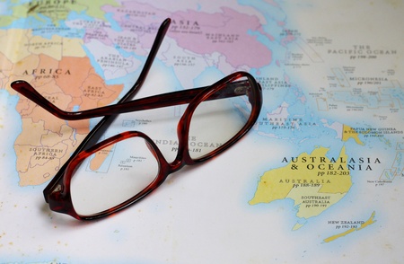 glasses on geographic book 