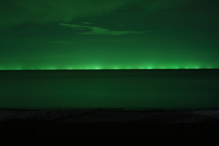 Green lights from fishing boats at night, gulf of Thailand の写真素材