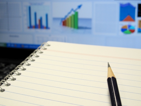 pencil, notebook, graph and chart の写真素材