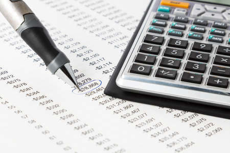 A pen with a financial calculator