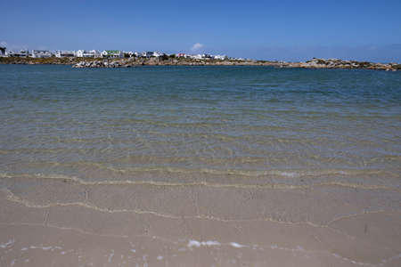 A pure transparent water in a sandy seascapeの写真素材