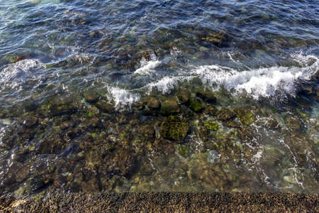 A beautiful view of a seascape with rocksの写真素材