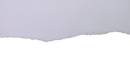 Torn purple paper with rough edge. White copy space in lower half.の写真素材
