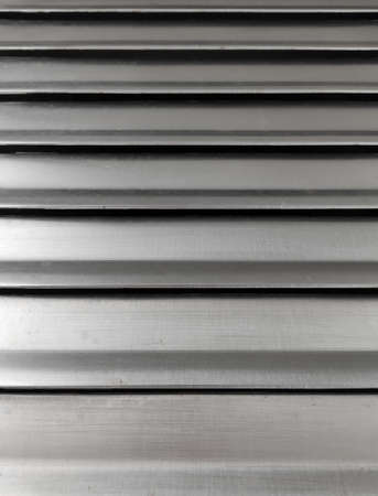 Steel metal panel with horizontal slits as ventsの写真素材