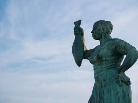 Monument to the women of the sea. Statue to remember fish sellers in Povoa de Varzim, Portugal.のeditorial素材