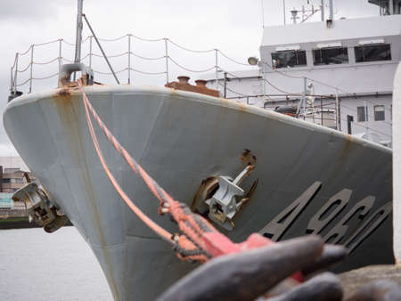 Belgian navy military ship berthed on river Liffey in Dublin, Ireland.のeditorial素材