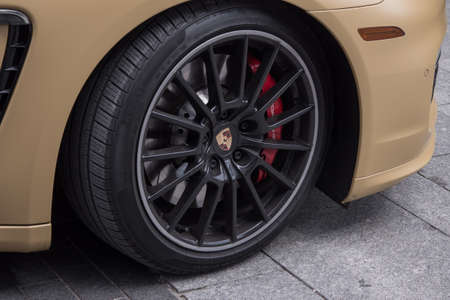 Wheel and tyre of a Gold Porsche luxury carのeditorial素材