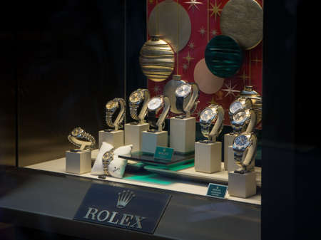 Expensive Luxury Rolex watches on display in a store window in London, Englandのeditorial素材