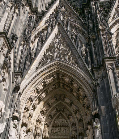 Statues at entrance of Cologne Cathedral, Germany, Europe. Built in 13th century.の写真素材