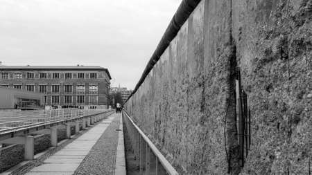 Remnants of Berlin Wall at Niederkirchnerstrasse near Checkpoint Charlie. Black and white.のeditorial素材