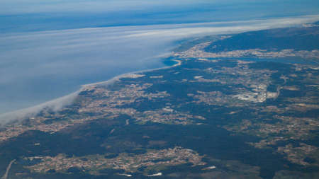 Viana do Castelo and Lima River in Portugal. High altitude aerial shot from planeの写真素材