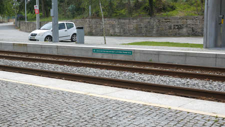 Metro train platform in Porto region, Portugal, with notice in English.のeditorial素材