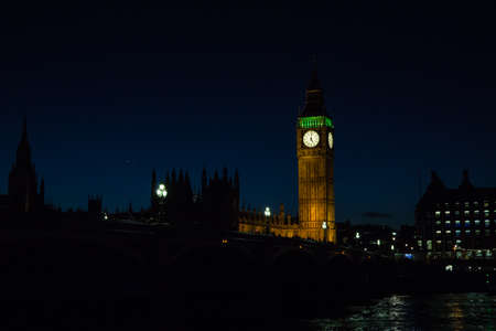 Big Ben and Palace of Westminster at night in London, England.