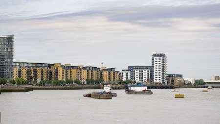 River Thames at Deptford, London, England with barges on the riverのeditorial素材