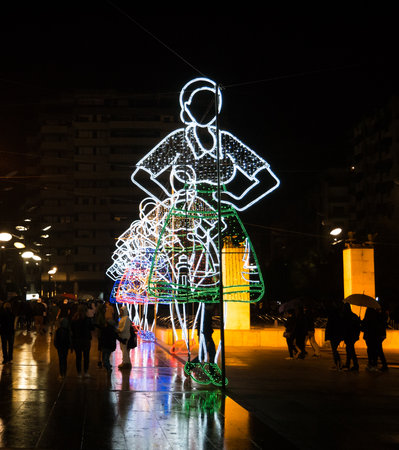 Light display in the form of Portuguese women in traditional dress for the Festa de Sao Pedro in Povoa de Varzim, Portugalのeditorial素材