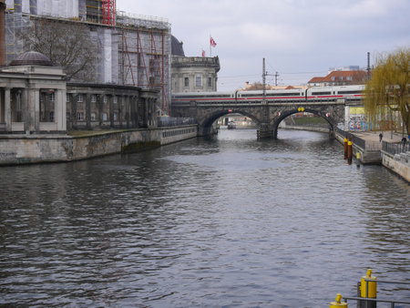 Train passing over bridge on River Spree in Berlin, Germanyのeditorial素材