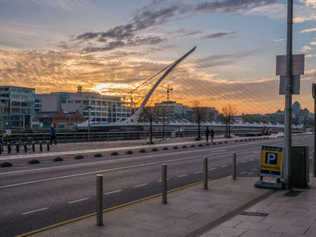 Dublin Quays and Samuel Beckett Bridge in Dublin, Ireland at Sunsetのeditorial素材