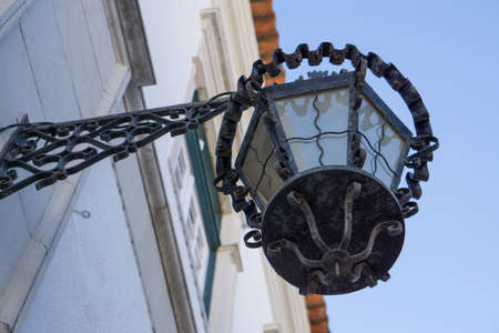Old vintage, rusty gas street lamp in Faro, Algarve, Portugalの写真素材