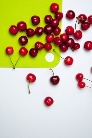 Gean - sweet cherry berries on white woodの写真素材