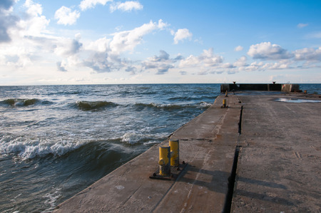 View of the pier on a sunny day at the seasideの写真素材