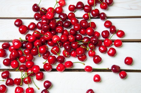 Gean - sweet cherry berries on white woodの写真素材