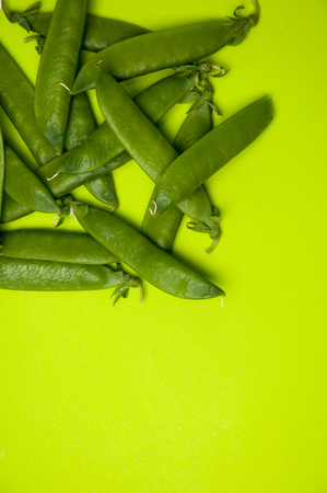 Green beans on green backgroundの写真素材