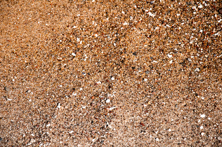 Closeup of sand pattern of a beach in the summerの写真素材