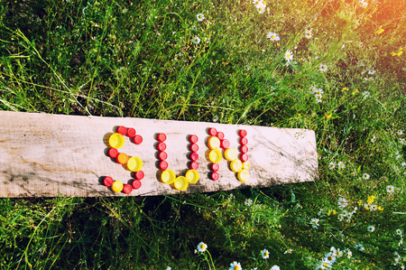 SUN made of plastic capsの写真素材