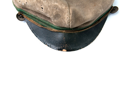 Old polish military cap on white backgroundの写真素材