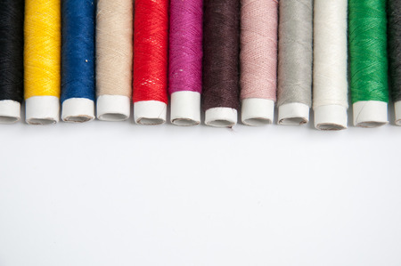 Sewing thread isolated on white backgroundの写真素材