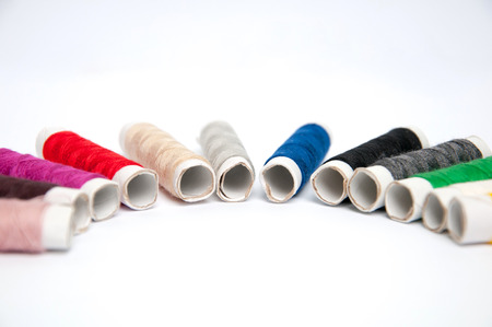Sewing thread isolated on white backgroundの写真素材