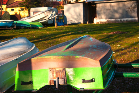 Upside down green boatの写真素材