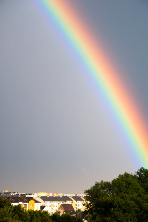 Rainbow over the cityの写真素材
