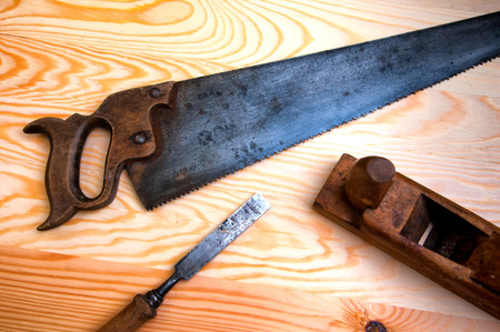 Set of carpenters working tools: plane, chisel, sawの写真素材