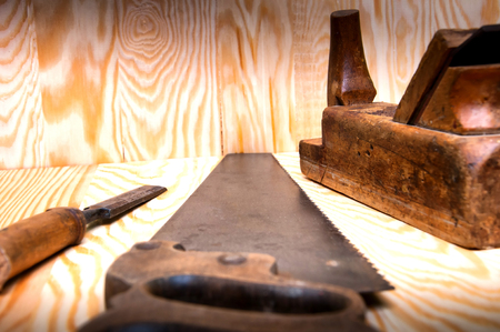 Set of carpenters working tools: plane, chisel, sawの写真素材