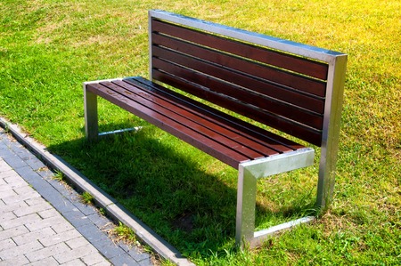 Stylish bench in summer parkの写真素材