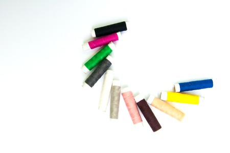 Sewing thread isolated on white backgroundの写真素材